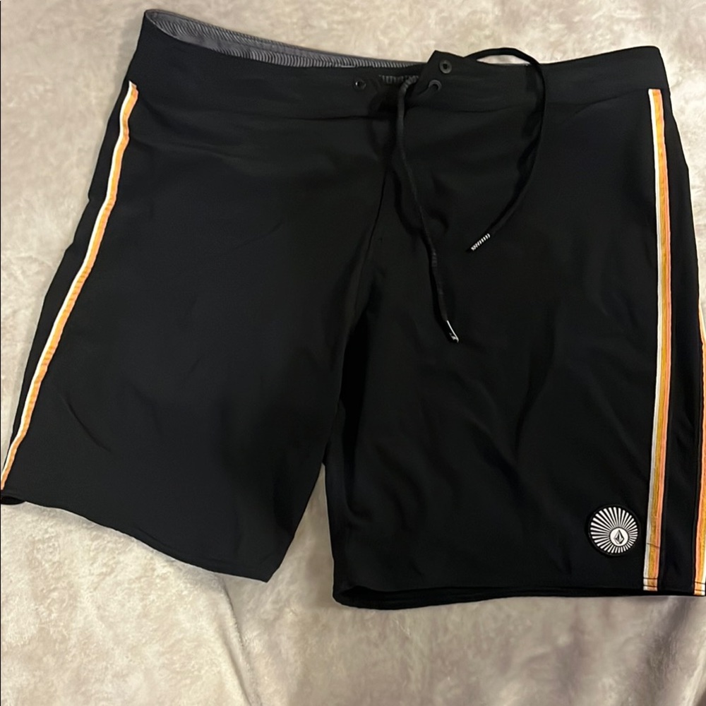 Black Swim Shorts with Orange Stripes by Volcom